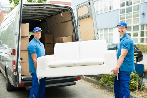 Removal team preparing a move on a residential street in Selhurst