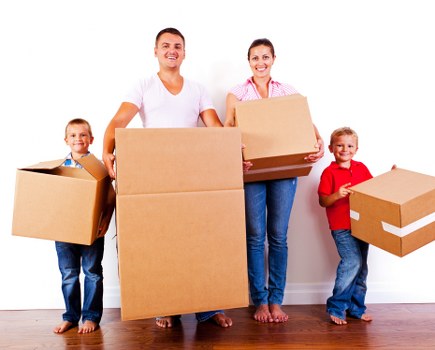 Removal van and moving boxes in a Selhurst residential street