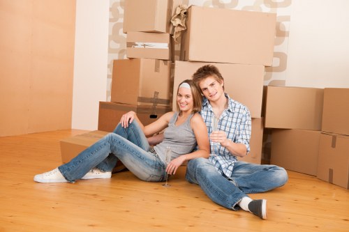 Packing supplies and carefully organised belongings ready for transport