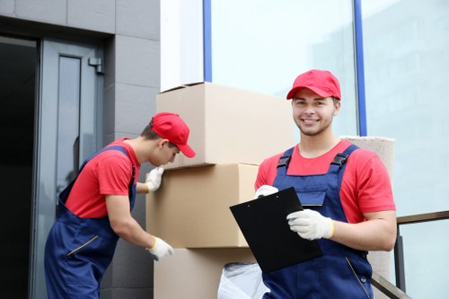 Local office relocation team handling commercial furniture near Selhurst
