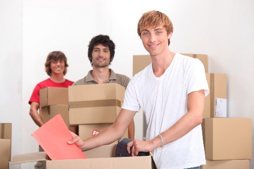 Family preparing essentials and labels for a smooth Selhurst home move