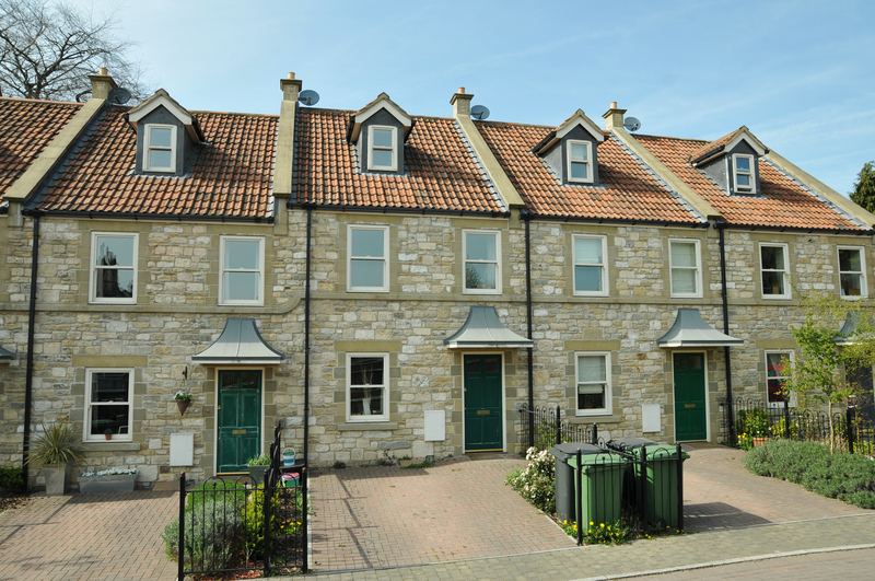 Professional movers handling furniture for a home move in Selhurst